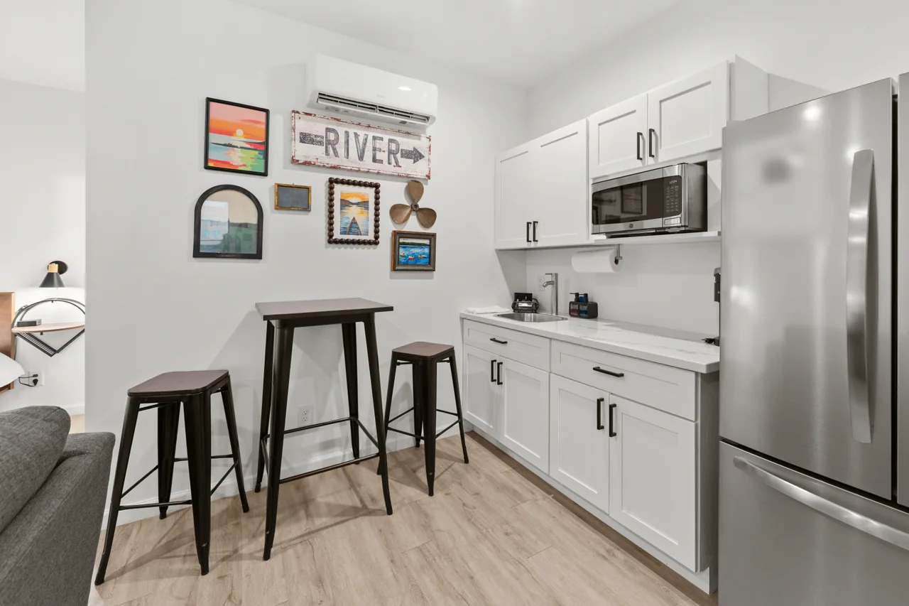 River kitchenette with bar sink, fridge and microwave